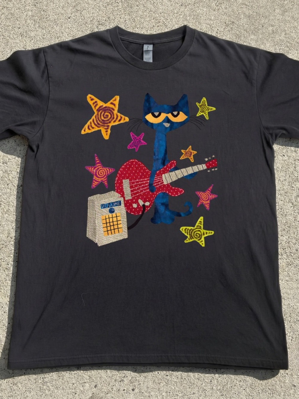 Graphic Black Tee with Colorful Cat Guitar Design